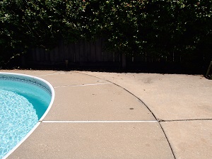 Sinking pool deck repaired with concrete lifting