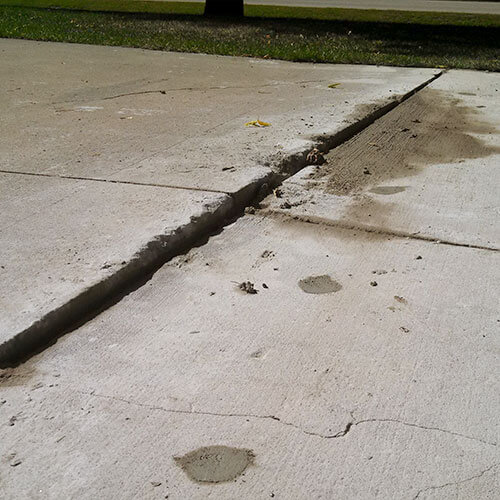 Cracked uneven driveway