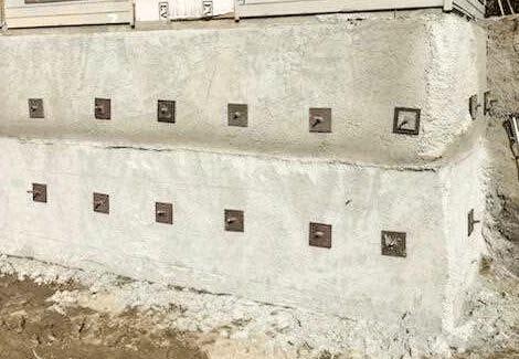 Helical pier equipment used for commercial foundation support in Beaverton Oregon