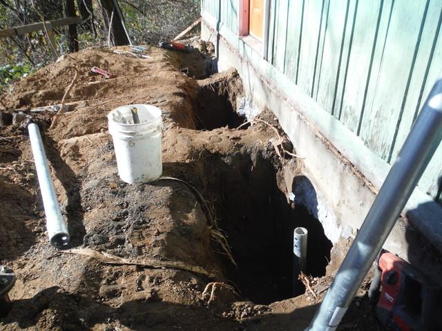 Deep foundation pier installation for commercial structural stabilization