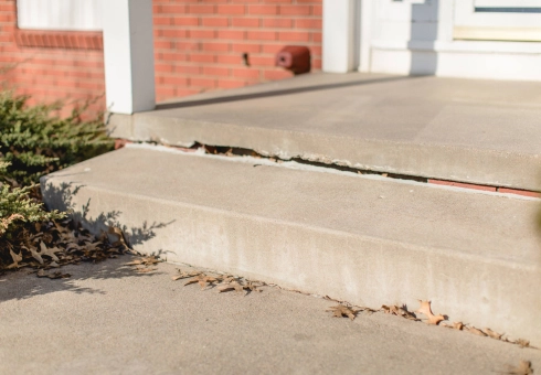 uneven porche sunken concrete porch