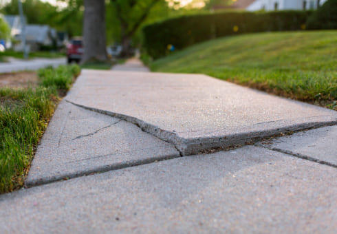 cracked sidewalk uneven small foundation repair