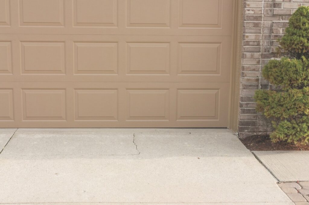 Concrete driveway lifted, leveled, and sealed in Sammamish, WA