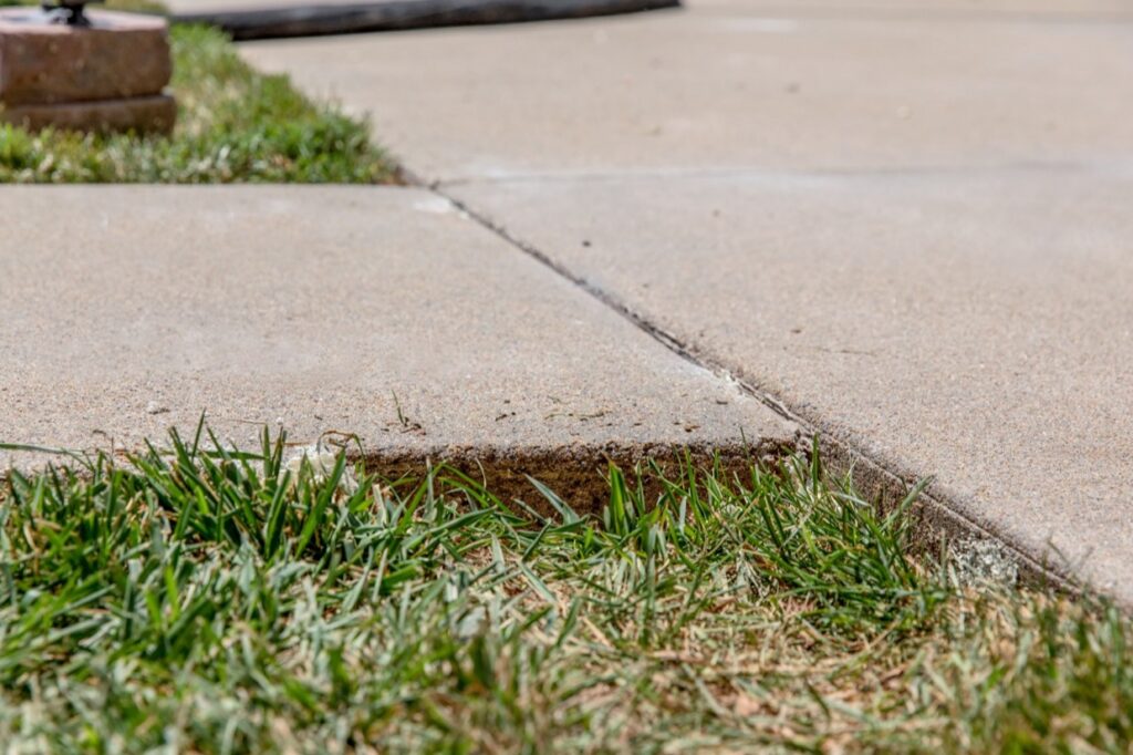 Ballard Concrete Sidewalk Repair Protects Lawn- Seattle, WA The results of this Ballard neighborhood home's concrete lifting job is a smooth, flat sidewalk