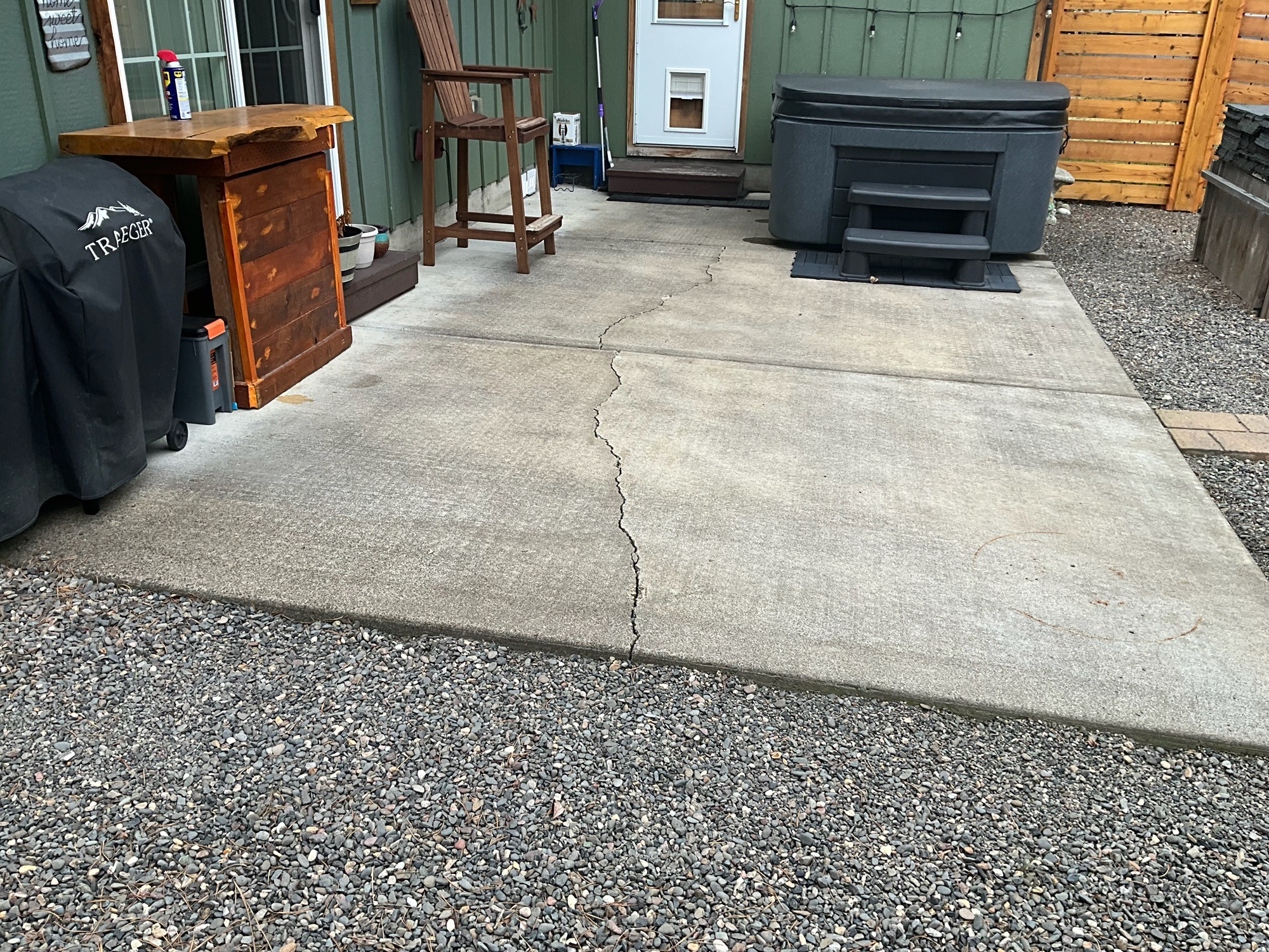 cracked-concrete-patio-before-bend cracked concrete patio before bend Vuba Stone in Bend