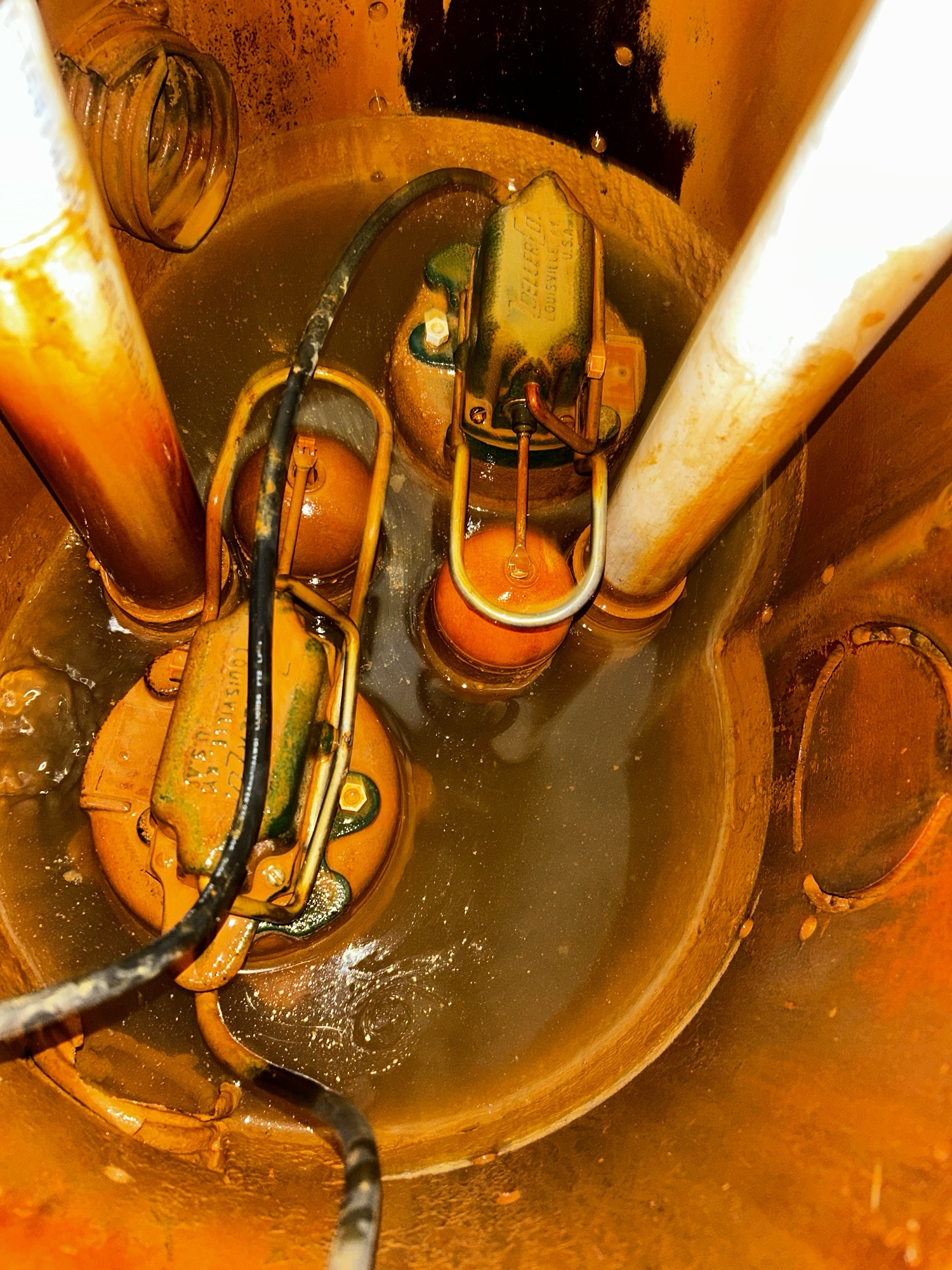 Iron ochre contamination inside a basement sump pump system