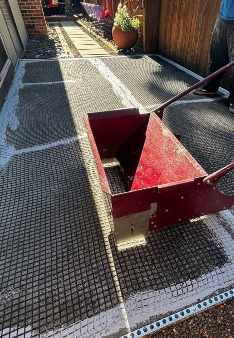 Early stage of Vuba Stone installation on a prepared exterior concrete surface